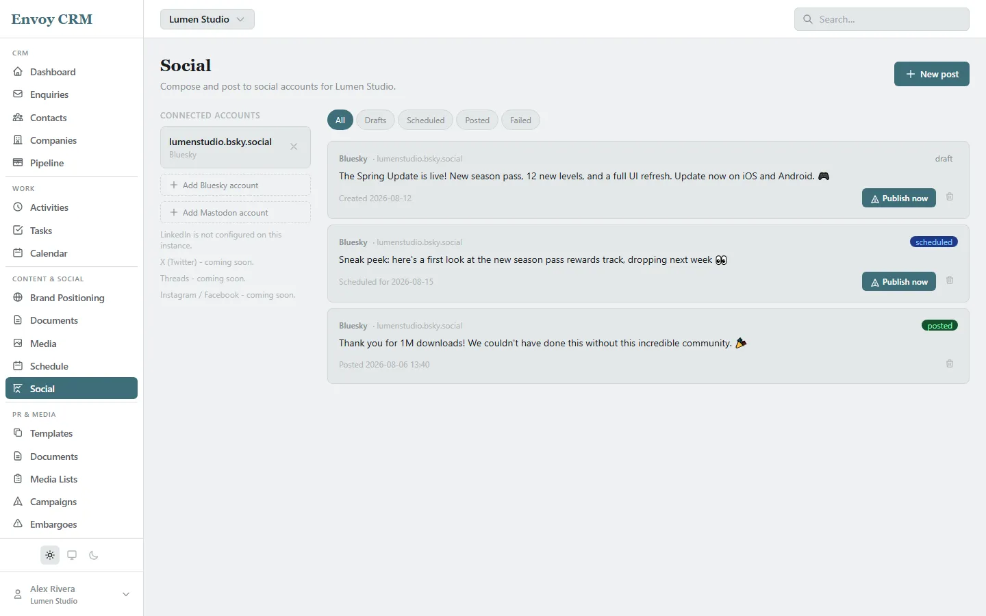 The Social page showing a draft, a scheduled post, and a posted update to a connected Bluesky account